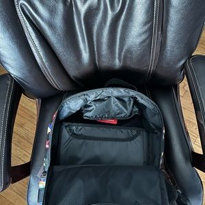 Spray ground backpack